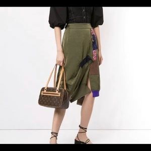 Guarantees Authentic LV MM Cite